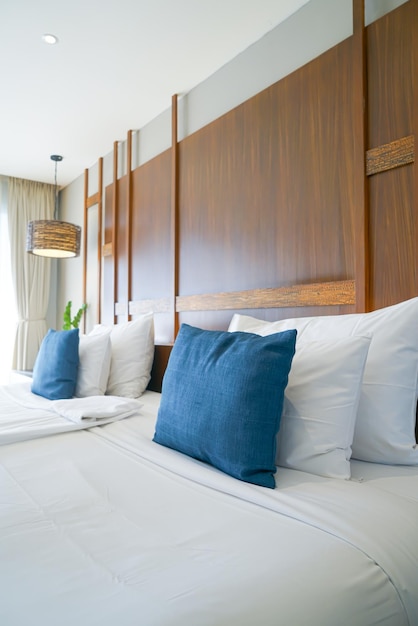 comfortable pillows and white pillows on bed
