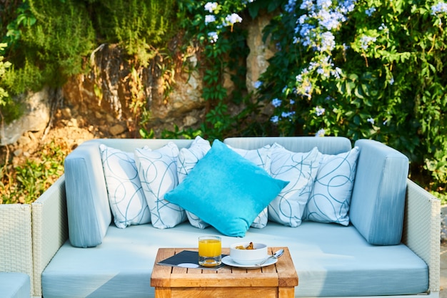 Comfortable seats and pillows in the garden