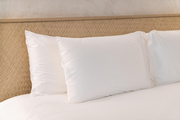 comfortable white pillows decoration on bed