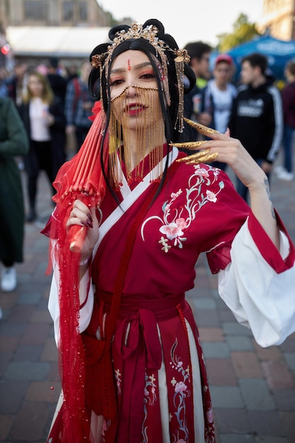 Photo comic con 2021 ukraine girl cosplayer in the costume of a japanese geisha