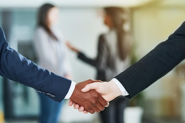 Coming to an agreement Shot of businesspeople shaking hands