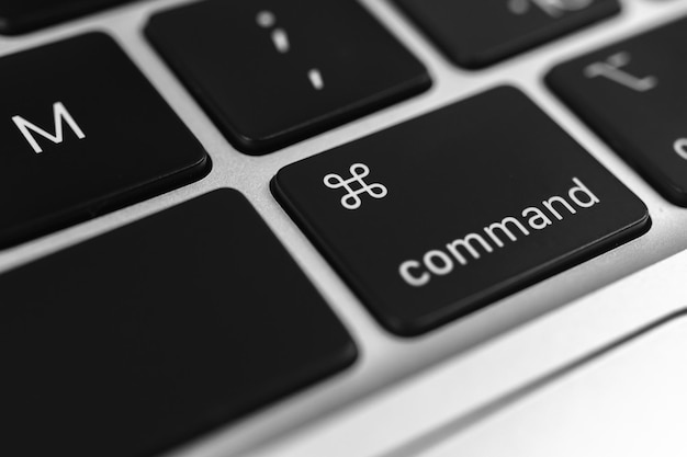 Command key and button on keyboard Command sign closeup Modern laptop communication concept photo