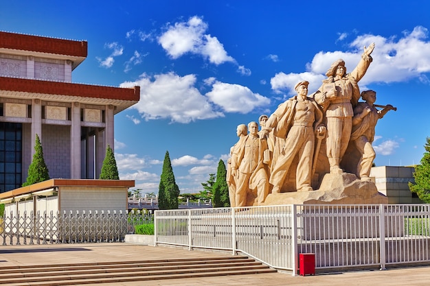 Photo commemorating statues of workers in struggle in the revolution of china located near  mausoleum of mao zedong, beijing. china.