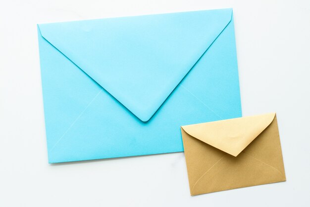 Communication newsletter and business concept  envelopes on marble background message