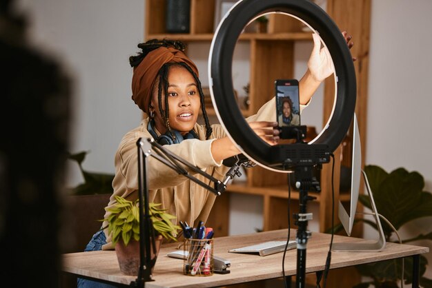 Photo communication phone and influencer live streaming podcast radio talk show or speaker talk about teen culture presenter microphone black woman setup broadcast or speaking about online student news