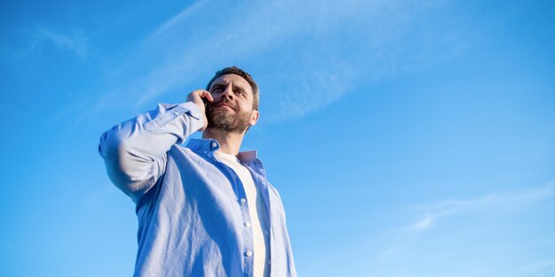 Communication of positive man talk on phone man talking on smartphone man communication talk