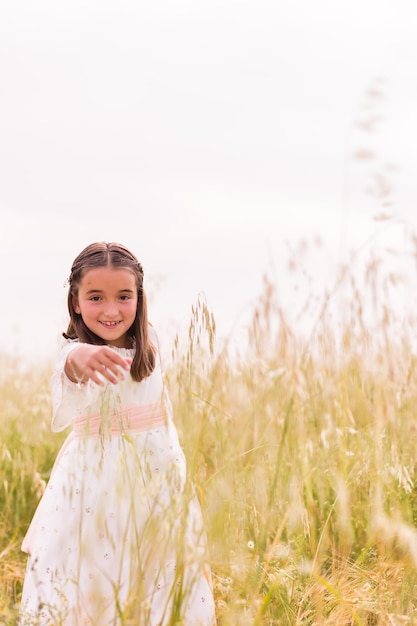 Communion girl catholic religion child celebration hispanic female portrait summer and spring