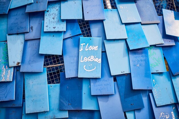 Photo community art tiles with lgbtq messages eye level view
