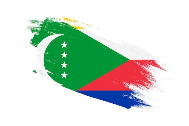 Comoros flag with stroke brush painted effects on isolated white background