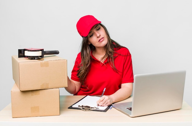 company packer employee on a desk with a laptop