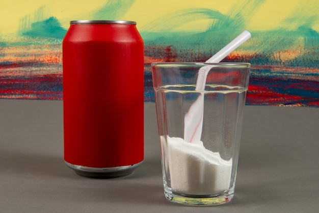 Comparison of the amount of sugar in a can of soda