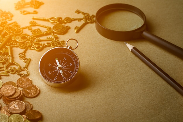 Compass on brown paper background.