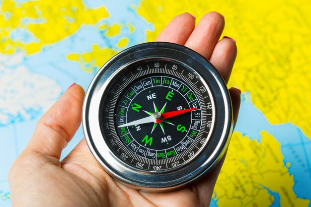 Compass on map background travel