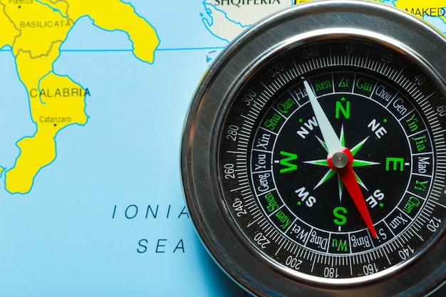 Compass on map background travel