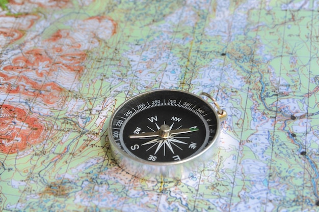 Photo compass and map the magnetic compass is located on a topographic map