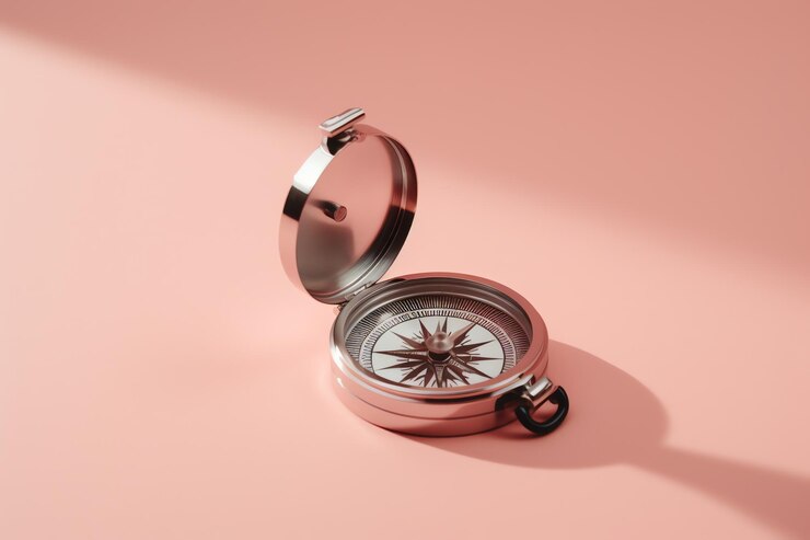 Compass in a pink background