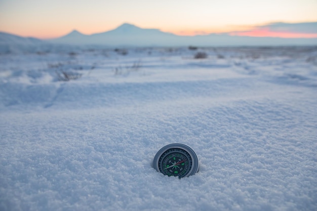 Compass in the snow