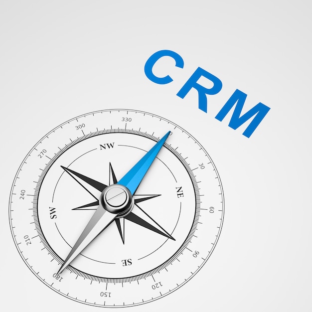 白い背景のコンパス、CRMコンセプト