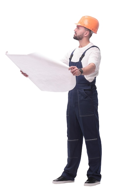 Competent foreman Builder looking at drawings isolated on white