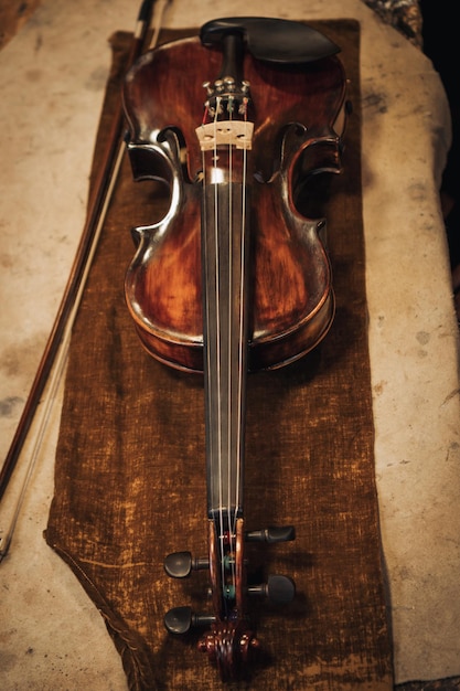 Complete antique violin on antique cloth