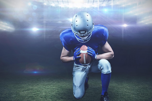 Composite image of american football player kneeling