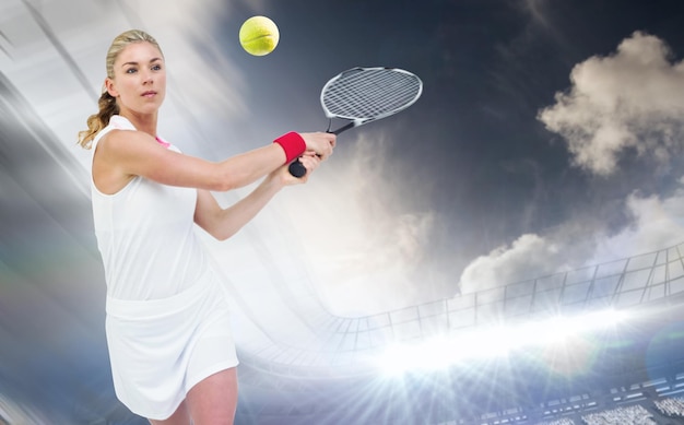 Composite image of athlete playing tennis with a racket