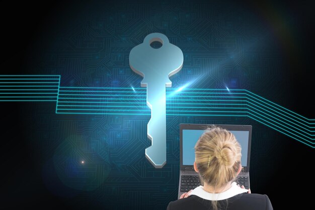composite image of blonde businesswoman using laptop