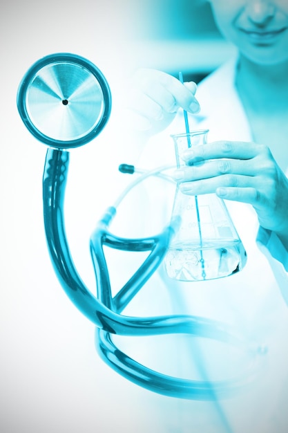 Composite image of blue stethoscope