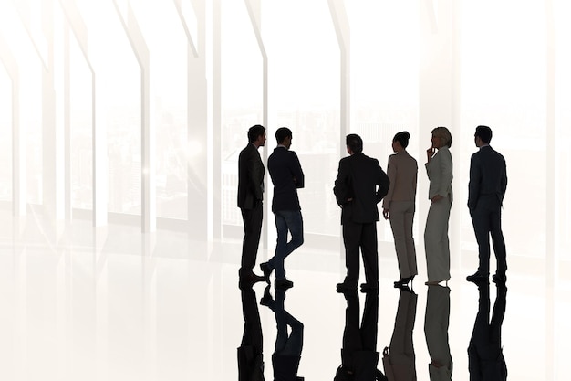 Photo composite image of business colleagues standing in large room overlooking city