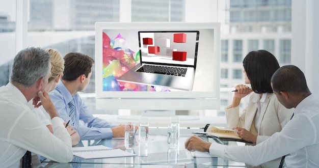 Composite image of business people looking at blank whiteboard in conference room