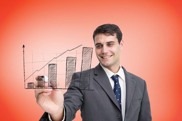 फोटो composite image of businessman drawing graph against orange