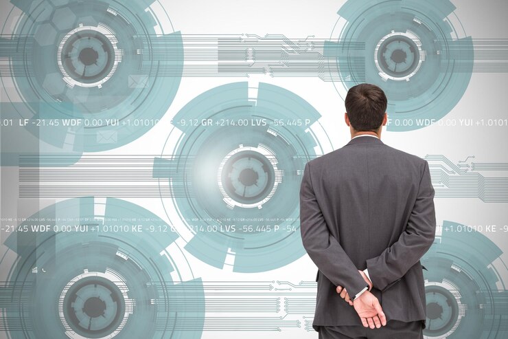 फोटो composite image of businessman standing with hands behind back looking at white green abstract background