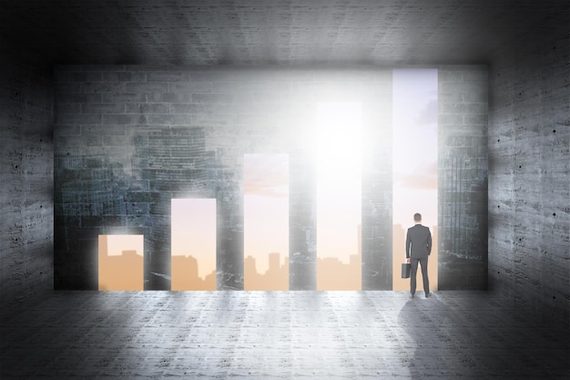 Composite image of businessman standing with his briefcase