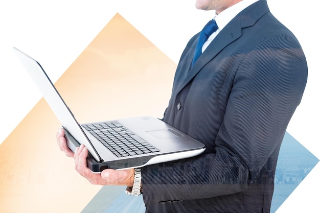 Composite image of businessman with watch using tablet pc