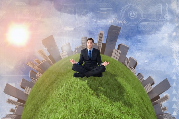 Composite image of calm businessman sitting in lotus pose