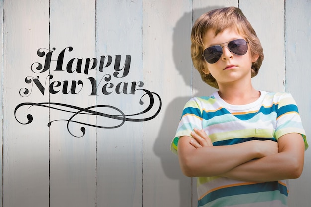 Composite image of child with sun glasses