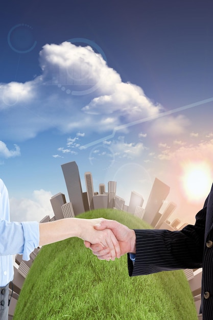 Composite image of close up of a business people closing a deal