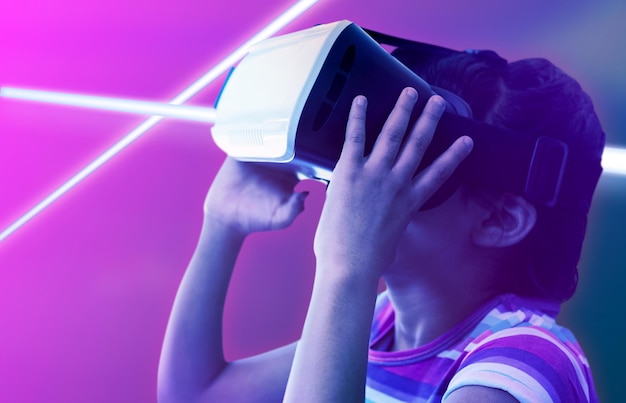 Composite image of close up of girl wearing virtual reality simulator