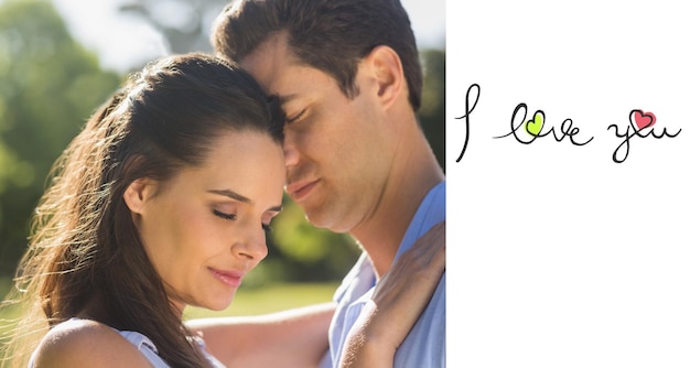 Composite image of close-up of loving couple embracing in park