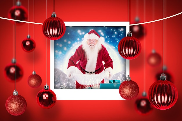 Composite image of composite image of santa open his red bag