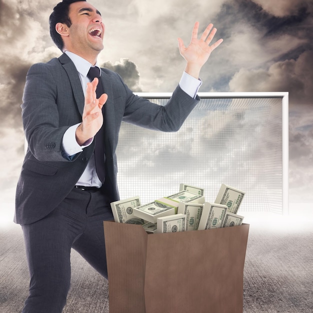 Photo composite image of excited businessman catching