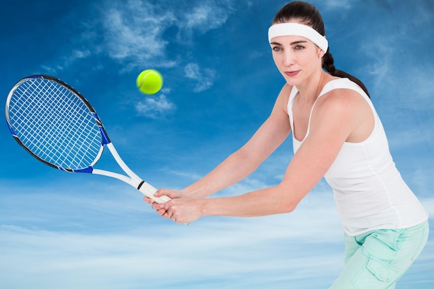 Composite image of female athlete playing tennis