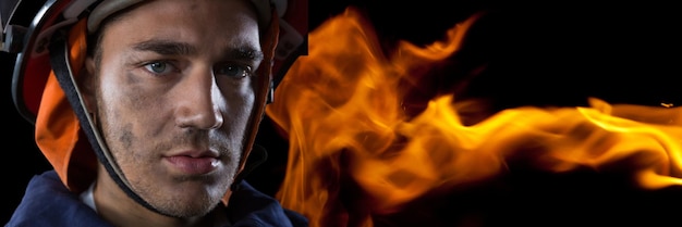 Composite image of firefighter with fire background