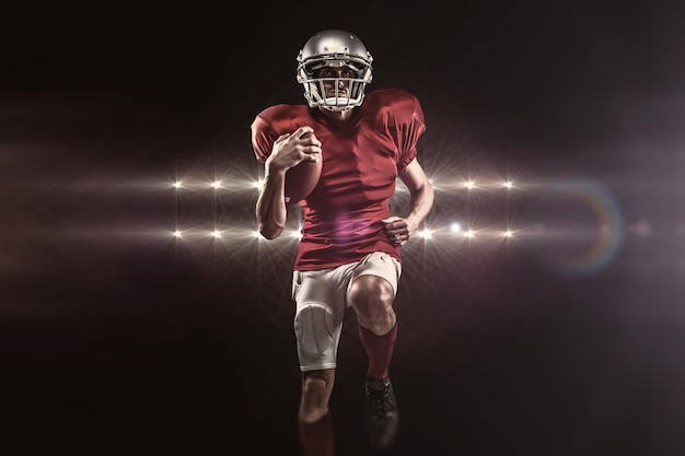 Composite image of full length of american football player in red jersey running