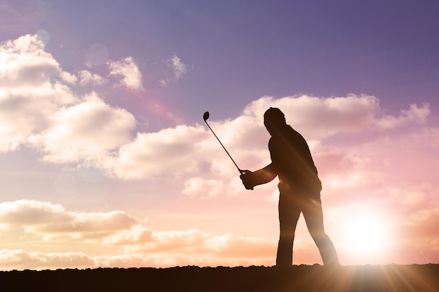 Composite image of golf player taking a shot