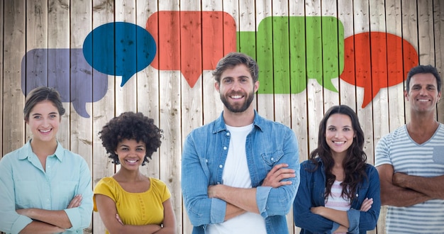 Composite image of group portrait of happy young colleagues