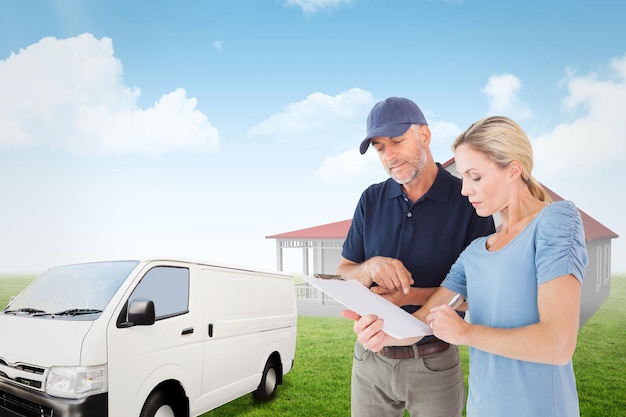 Composite image of happy blonde signing for a delivery