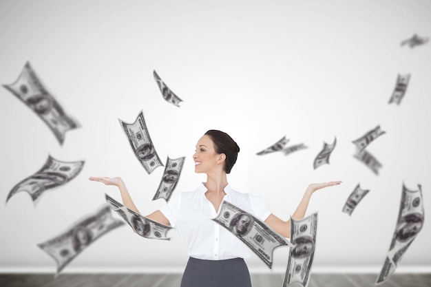 Composite image of happy elegant businesswoman posing with dollars