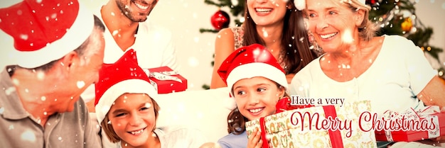 Composite image of happy family at christmas swapping gifts