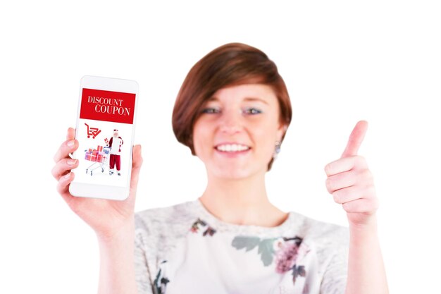 Composite image of happy woman gesturing thumbs up while showing smart phone